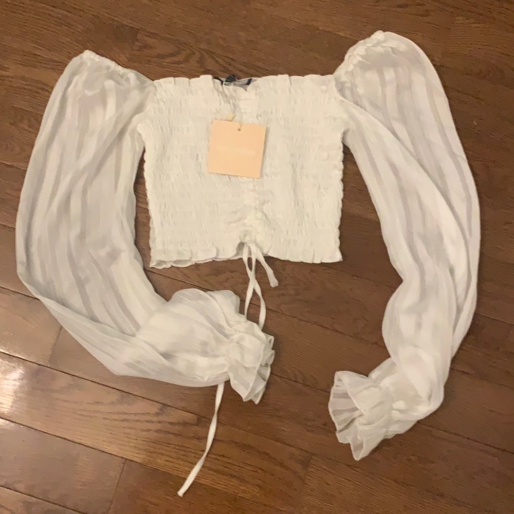 Kittenish off shoulder white top